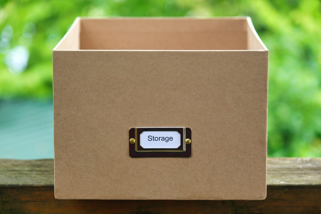 Cardboard box with storage written on it