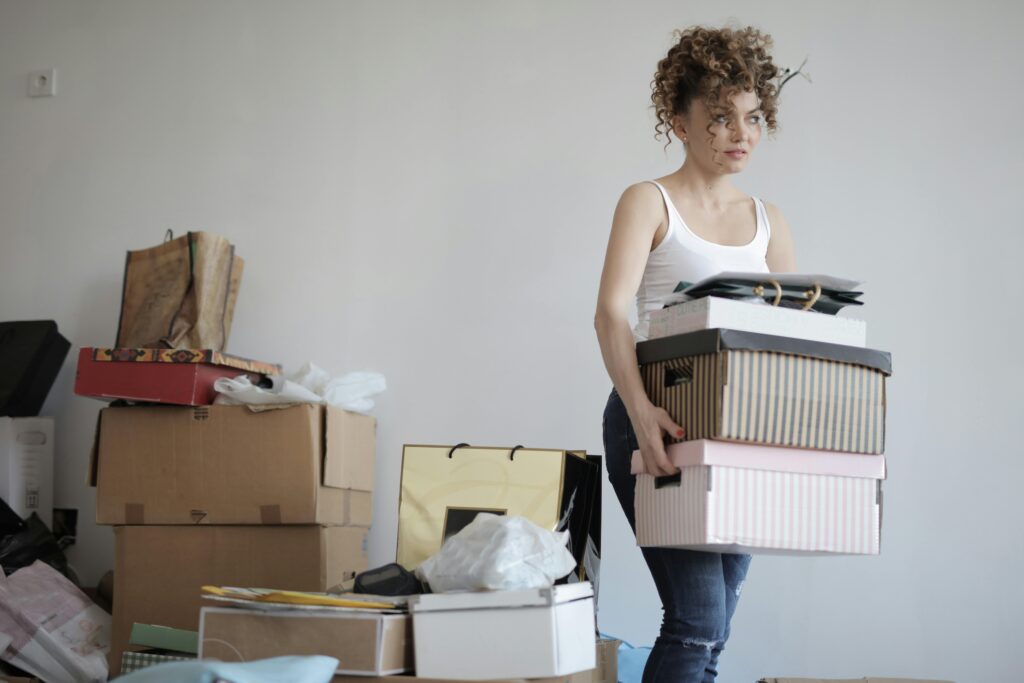Woman carrying boxes